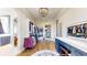 Spacious walk-in closet with hardwood floors, custom shelving, and a vanity area at 220 High Meadows Loop, Elizabeth, CO 80107