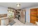 Well-equipped kitchen with stainless steel appliances and ample storage space at 3384 Avenue F, Kittredge, CO 80457