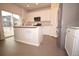 Modern kitchen with island and stainless steel appliances at 5155 Trails Edge Ln, Castle Rock, CO 80104