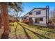 A well-maintained backyard with a red deck and patio, perfect for outdoor living at 15974 E Loyola Dr, Aurora, CO 80013