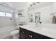 Stylish bathroom features modern fixtures, subway tile, and a shower-tub combination at 9400 E Iliff Ave # 145, Denver, CO 80231