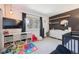 room with storage, toys, and a large window offering a view of the outdoors at 9400 E Iliff Ave # 145, Denver, CO 80231