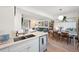 Bright, open kitchen flows into living and dining areas, perfect for entertaining and Gathering gatherings at 9400 E Iliff Ave # 145, Denver, CO 80231
