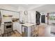 Modern kitchen with stainless steel appliances, quartz countertops, and an open floor plan at 9400 E Iliff Ave # 145, Denver, CO 80231