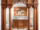 Luxurious bathroom featuring a marble vanity, wooden columns, and carved wood accents at 1022 N Pearl St # 202, Denver, CO 80203