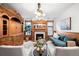 Elegant living room featuring a fireplace, hardwood floors, and stylish decor at 1022 N Pearl St # 202, Denver, CO 80203