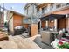 Outdoor patio featuring brick accents, patio furniture, and barbecue grill at 1022 N Pearl St # 202, Denver, CO 80203