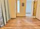 Open-concept living room featuring wood-style flooring and neutral wall color at 909 S Dawson Way # 19, Aurora, CO 80012