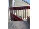 View of the staircase from the doorway with railing and view of the building's exterior at 909 S Dawson Way # 19, Aurora, CO 80012