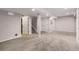 Finished basement with carpet flooring, closet, access to stairs and recessed lighting at 4739 Raven Run, Broomfield, CO 80023