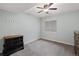 A cozy bedroom with neutral paint, carpet, a dresser and double-hung windows at 4739 Raven Run, Broomfield, CO 80023
