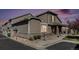 Charming townhome featuring stone accents, well-maintained landscaping, and an attached one car garage at 4739 Raven Run, Broomfield, CO 80023