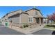 Charming townhome featuring stone accents, well-maintained landscaping, and an attached one car garage at 4739 Raven Run, Broomfield, CO 80023