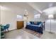 Finished basement featuring a daybed, and concrete floors at 2201 S Lowell Blvd, Denver, CO 80219