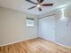 Bright bedroom features hardwood floors, ceiling fan, closet and neutral paint at 1145 W 101St Ave, Northglenn, CO 80260