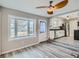 Bright dining area with bay window looks into the updated kitchen at 1145 W 101St Ave, Northglenn, CO 80260