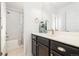 Well-lit bathroom with a tub/shower combination and a vanity with ample storage at 10788 Ventura St, Commerce City, CO 80022