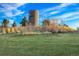 Welcome to Reunion! View of Reunion entrance with beautiful landscaping and community signage at 10788 Ventura St, Commerce City, CO 80022
