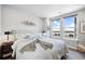 Main bedroom with large windows and neutral decor at 20 Wilcox St # 314, Castle Rock, CO 80104