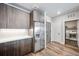 Modern kitchen features stainless steel appliances and wood cabinets at 20 Wilcox St # 314, Castle Rock, CO 80104