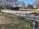 Outdoor basketball court in community featuring mature trees and park amenities at 1250 S Monaco Street Pkwy # 49, Denver, CO 80224