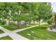 Exterior view showcasing the well-maintained lawn and walkway leading to the home at 1250 S Monaco Street Pkwy # 49, Denver, CO 80224