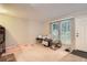 Inviting living room with natural light, neutral walls, and functional layout at 1250 S Monaco Street Pkwy # 49, Denver, CO 80224