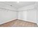 A tidy walk-in closet features neutral carpet flooring and wire shelving at 9092 Telluride Ct, Commerce City, CO 80022