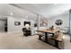 Finished basement with dining table, lounge area with sofa, and modern recessed lighting at 3444 Recess Pt, Castle Rock, CO 80108