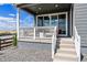 Covered porch featuring neutral seating, providing an outdoor space to enjoy views and relaxation at 3444 Recess Pt, Castle Rock, CO 80108