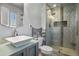 Modern bathroom with updated vanity and walk-in shower at 6618 S Newland Cir, Littleton, CO 80123