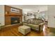 Living room with fireplace and hardwood floors at 6618 S Newland Cir, Littleton, CO 80123