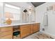 Bright bathroom features a double sink vanity and modern fixtures at 2867 S Oswego Ct, Aurora, CO 80014
