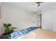 Comfortable bedroom with hardwood floors and good light from ceiling fixture at 2867 S Oswego Ct, Aurora, CO 80014