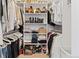 Walk-in closet with shelves, hanging rods, and space for shoes and other items at 2867 S Oswego Ct, Aurora, CO 80014