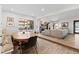Bright open concept dining and living area with hardwood floors at 2867 S Oswego Ct, Aurora, CO 80014
