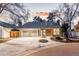 Charming single-story home featuring a landscaped front yard and two-car attached garage at 2867 S Oswego Ct, Aurora, CO 80014