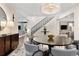 Beautiful dining room with an elegant chandelier and easy access to the staircase at 450 Steele St, Denver, CO 80206