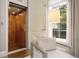 Home elevator with wooden interior, providing easy access to all floors at 450 Steele St, Denver, CO 80206