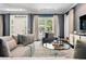 Bright and airy living room with French doors, comfortable seating, and modern décor at 450 Steele St, Denver, CO 80206