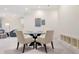 Bright living area with game table, modern lighting, and stylish decor at 450 Steele St, Denver, CO 80206
