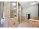 Modern bathroom with tile shower and glass door at 25357 Snyder Ave, Conifer, CO 80433