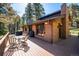 Outdoor deck with dining area perfect for entertaining or relaxing at 25357 Snyder Ave, Conifer, CO 80433