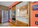 Kitchen cooktop and stainless appliances, featuring tiled backsplash at 25357 Snyder Ave, Conifer, CO 80433