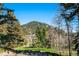 A picturesque landscape featuring rolling hills and lush trees, perfect for nature enthusiasts at 25357 Snyder Ave, Conifer, CO 80433