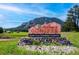 Welcome to Conifer sign, gateway to the area's nature and community at 25357 Snyder Ave, Conifer, CO 80433