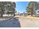 A pool with a fence and mature trees enhances the neighborhood amenities at 11917 Monroe St, Thornton, CO 80233