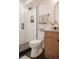 Modern bathroom with glass-enclosed shower and sleek wooden vanity at 527 Fox St, Denver, CO 80204