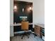 Stylish home office with a modern desk, custom lighting and a comfortable chair at 527 Fox St, Denver, CO 80204