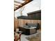 Inviting backyard hot tub with wooden pergola and fence, perfect for relaxation and entertainment at 527 Fox St, Denver, CO 80204
